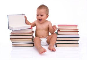 boy with books isolated on white