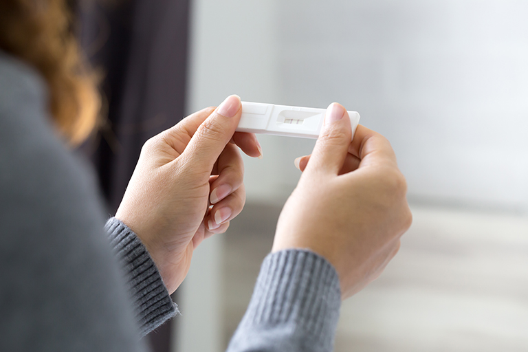 Woman experiencing an unplanned pregnancy