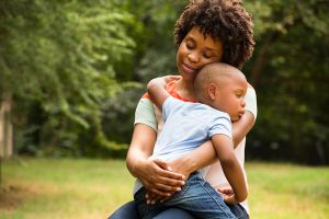 Young mother with child in an open adoption