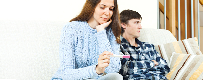 couple facing an unplanned pregnancy