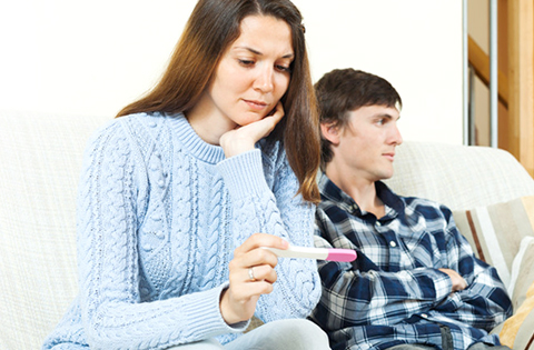 couple facing an unplanned pregnancy