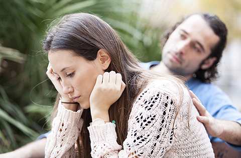 husband comforting wife after failed adoption